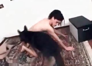 Naked chick playing with shepherd